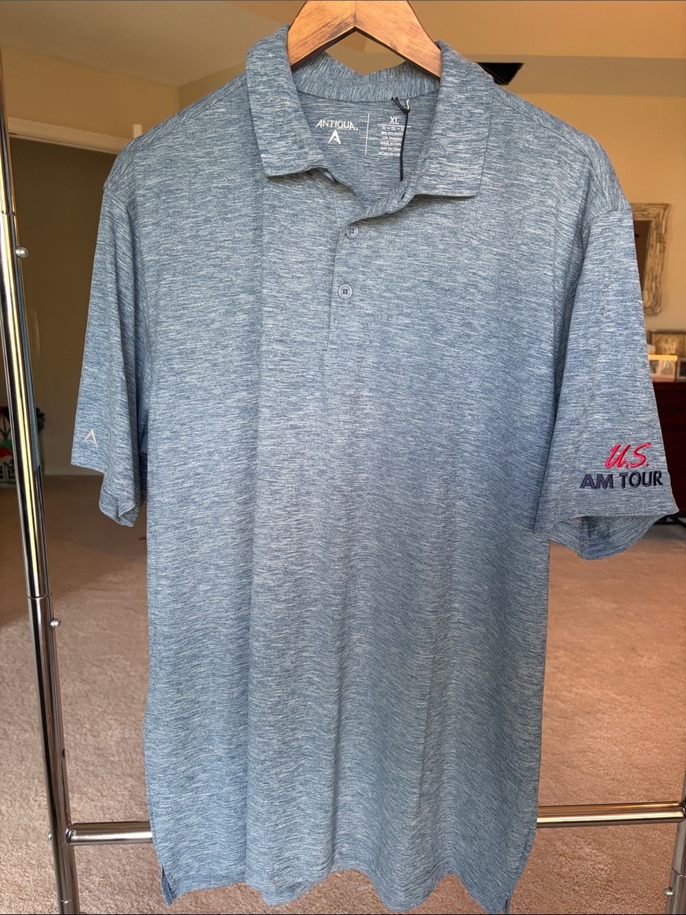 Antigua Heathered Light Blue Men's Polo with U.S. Am Tour Embroidery